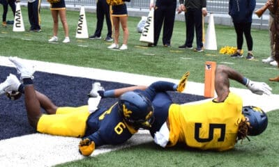 WVU Football DB Jacolby Spells and Devin Carter