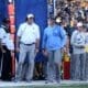 WVU Football Rich Rodriguez and Zac Alley on sideline