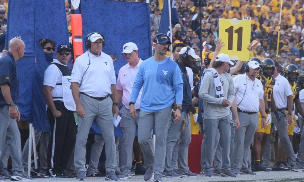 WVU Football Rich Rodriguez and Zac Alley on sideline