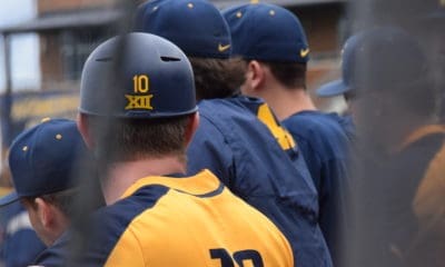 WVU Baseball players in dugout