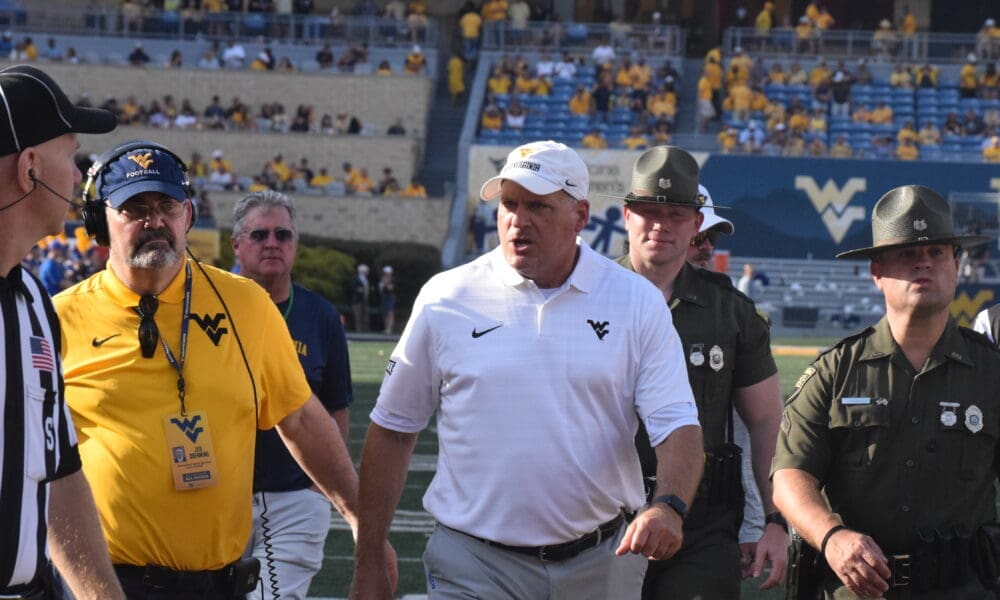 WVU Football HC Rich Rodriguez yells at ref