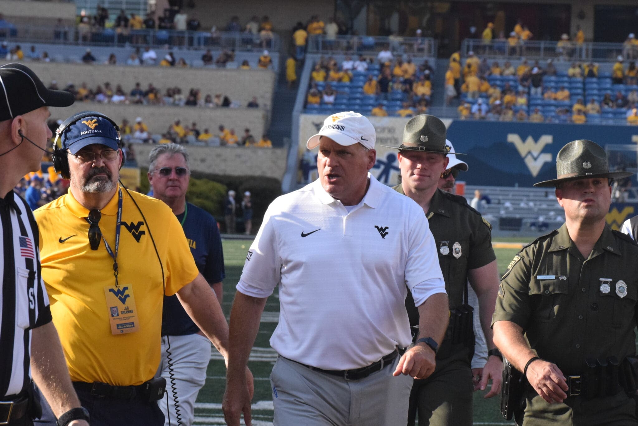 WVU Football HC Rich Rodriguez yells at ref