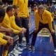 WVU Basketball HC Ross Hodge in huddle