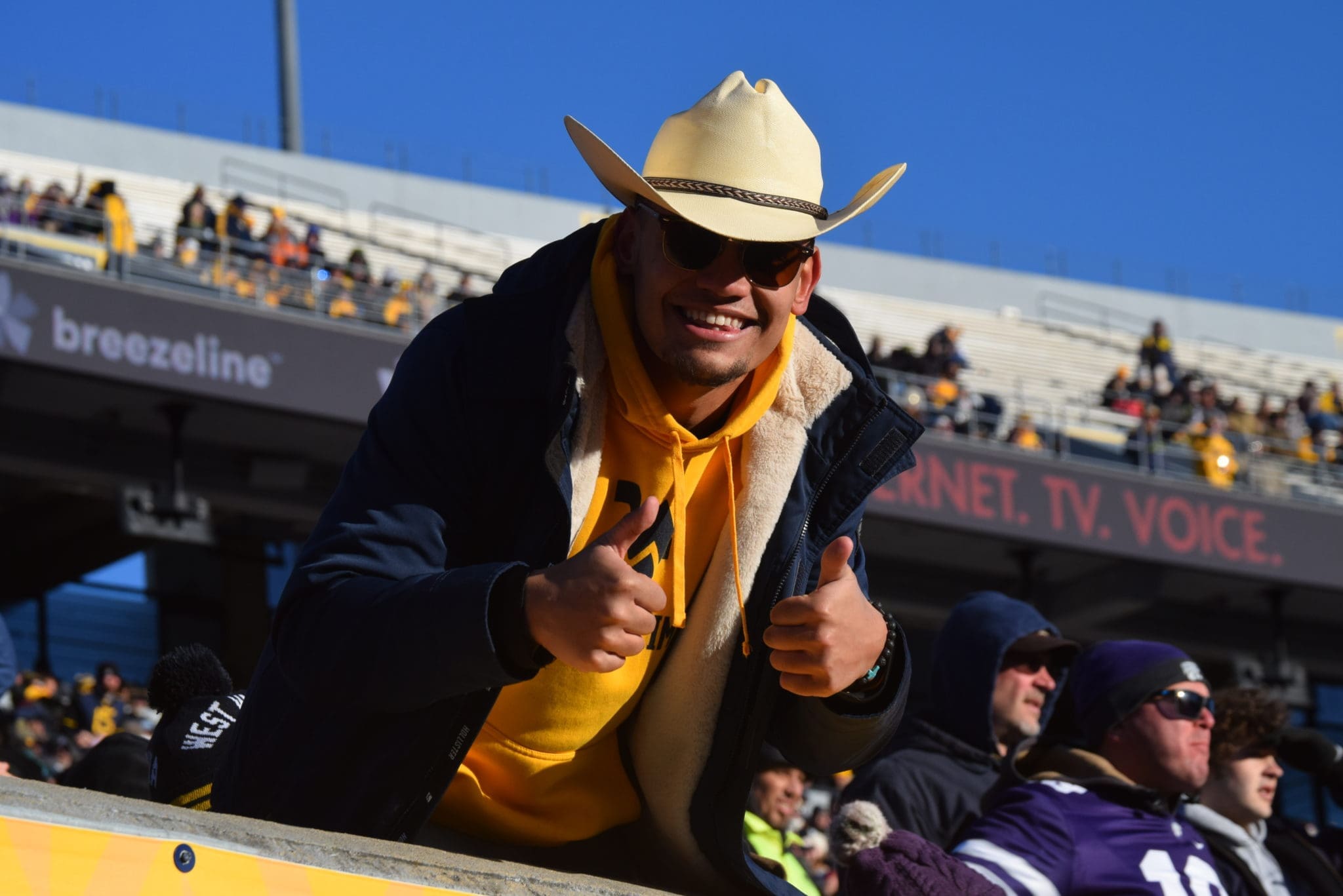 WVU fan with cowboy hat
