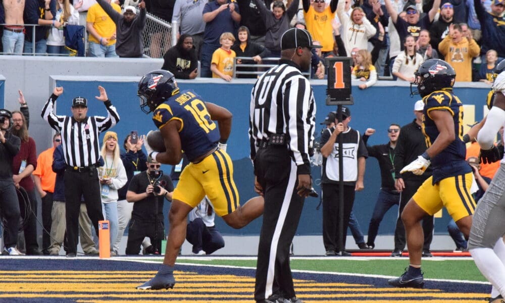 WVU Football LB/RB Curtis Jones run in for a touchdown against Colorado