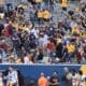 WVU Football Rich Rodriguez in stands with fans during spring showcase