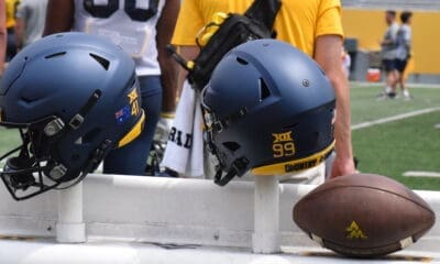 WVU Football blue helmets stock