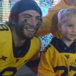 WVU Football QB Nicco Marchiol with fan