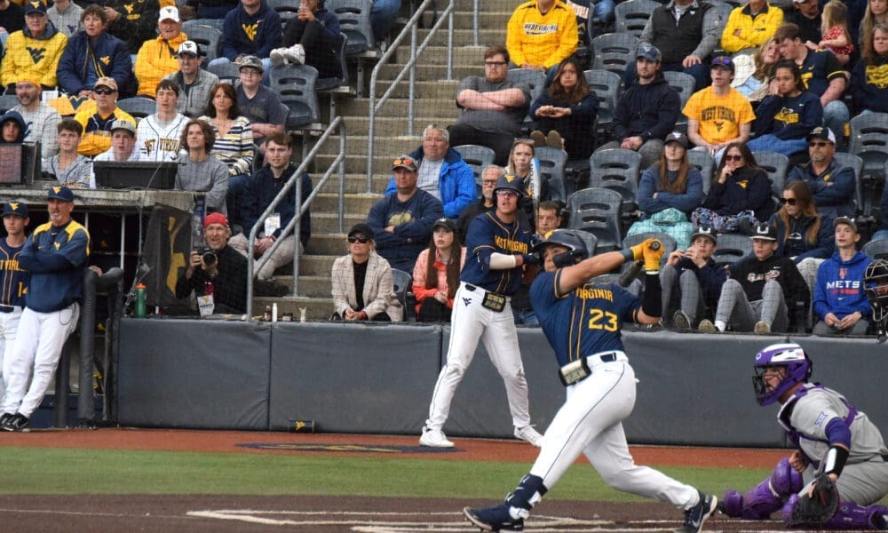 WVU Baseball infielder Ellis Garcia slugs a three-run home run against TCU.