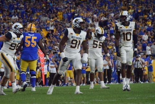 WVU football defense of Sean Martin, Dante Stills and Jared Bartlett