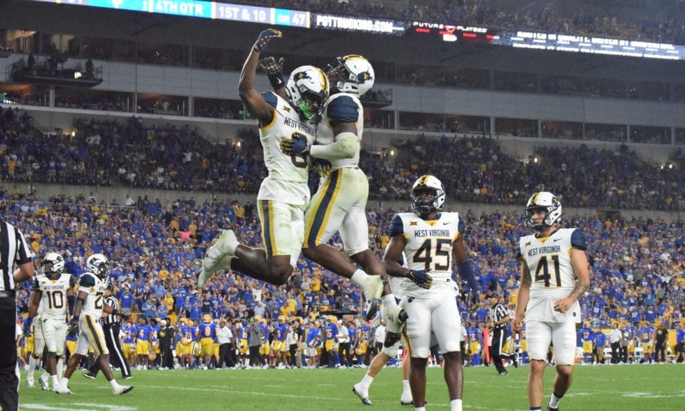 WVU defense celebrates at Pitt in Backyard Brawl