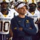 WVU Football HC Neal Brown leading team with Jared Bartlett