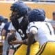 WVU Football QB Michael Hawkins Jr. and RB Amari Latimer during scrimmage