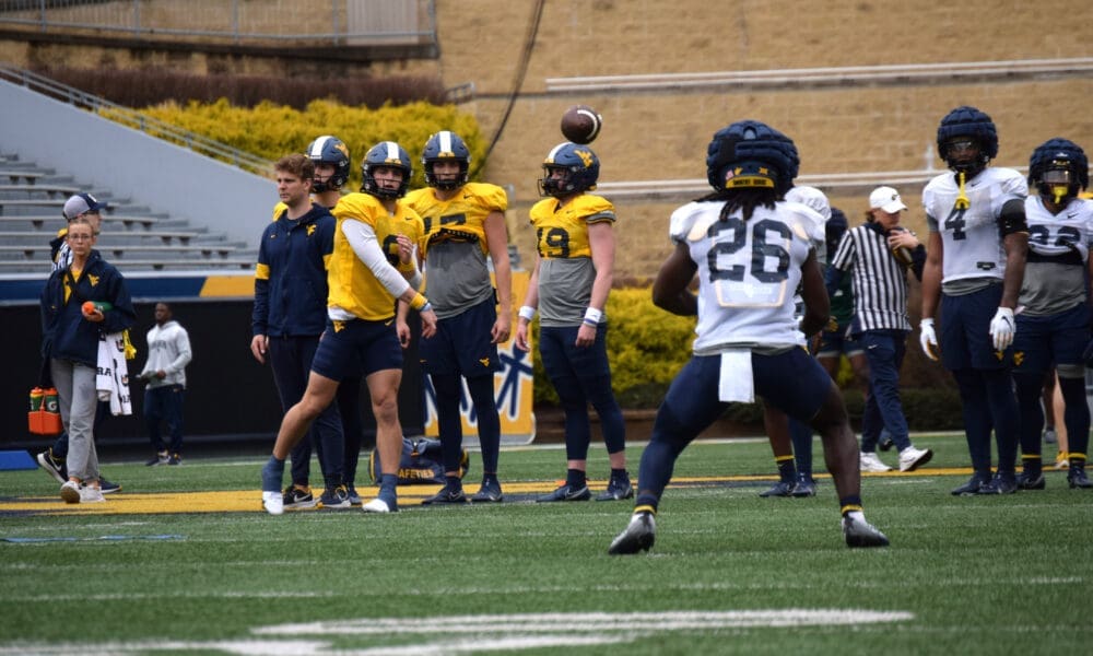 WVU Football QB Garrett Greene and RB Justin Johnson