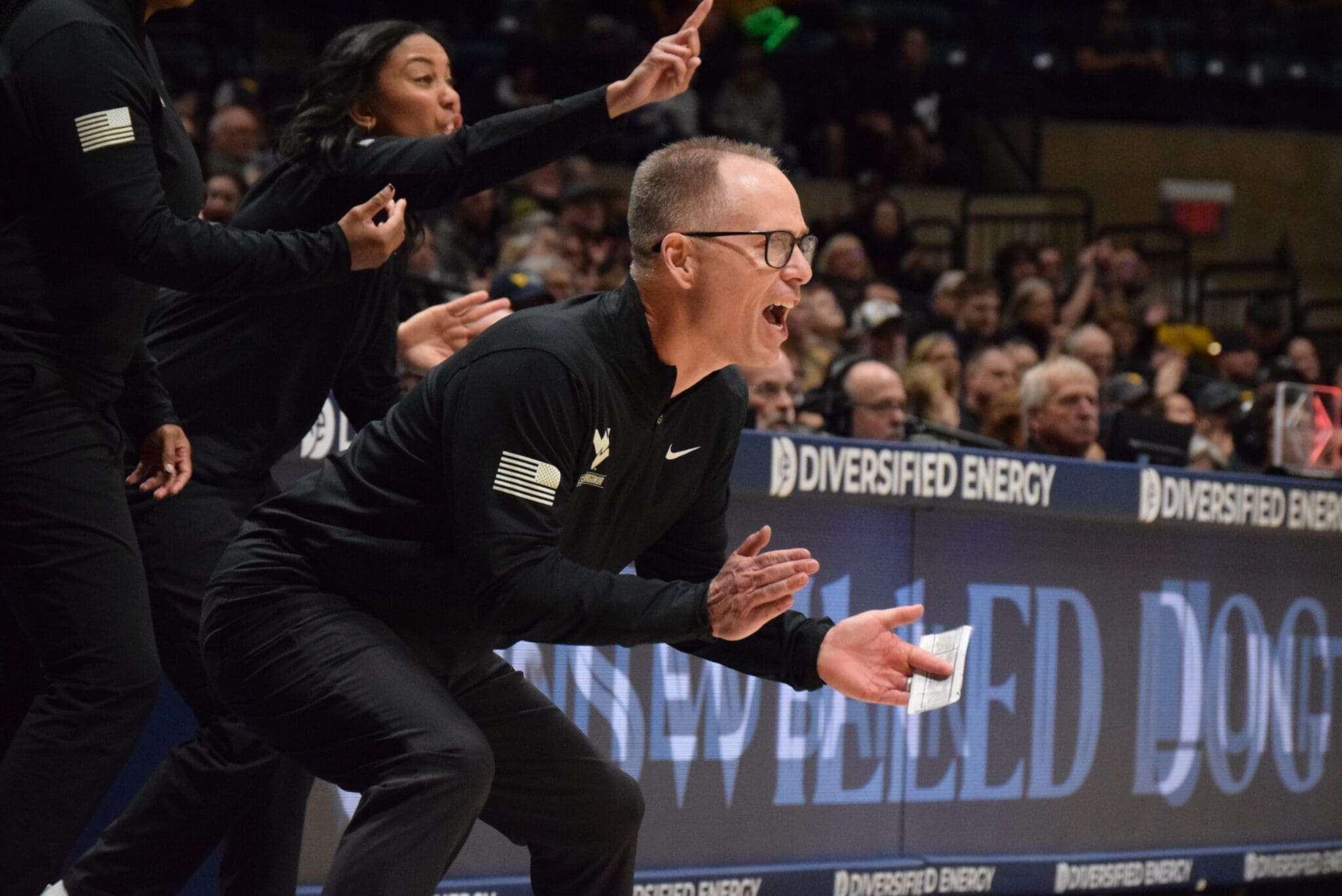 WVU Women's Basketball HC Mark Kellogg clapping