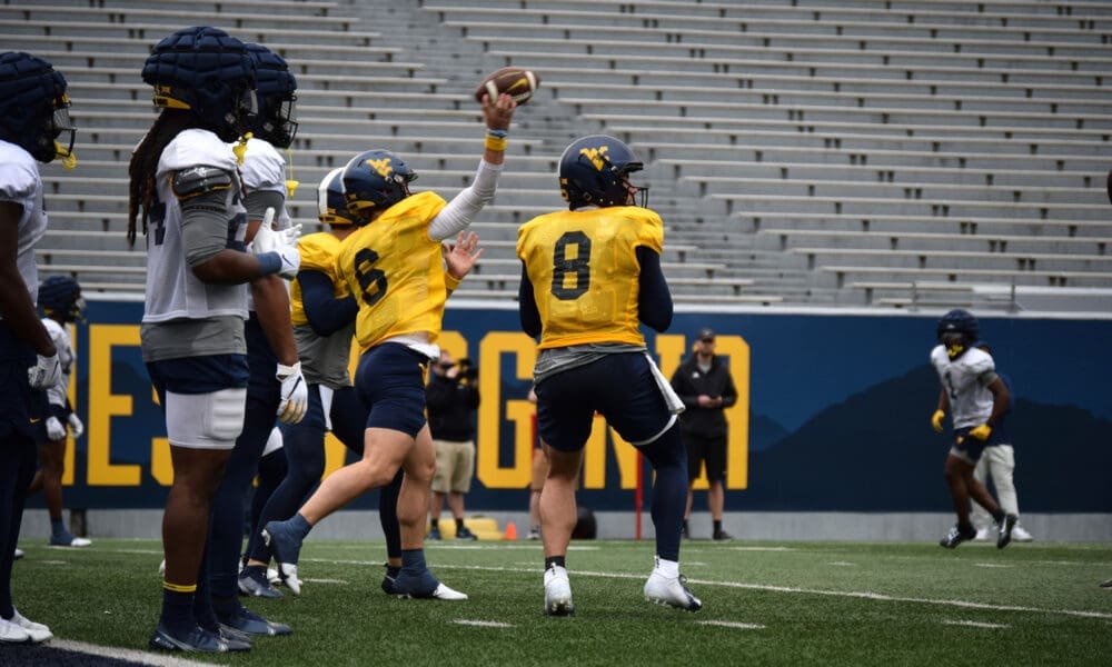 WVU Football quarterbacks Garrett Greene and Nicco Marchiol
