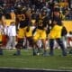 Zach Frazier and WVU Football Offensive Line and QB Garrett Greene