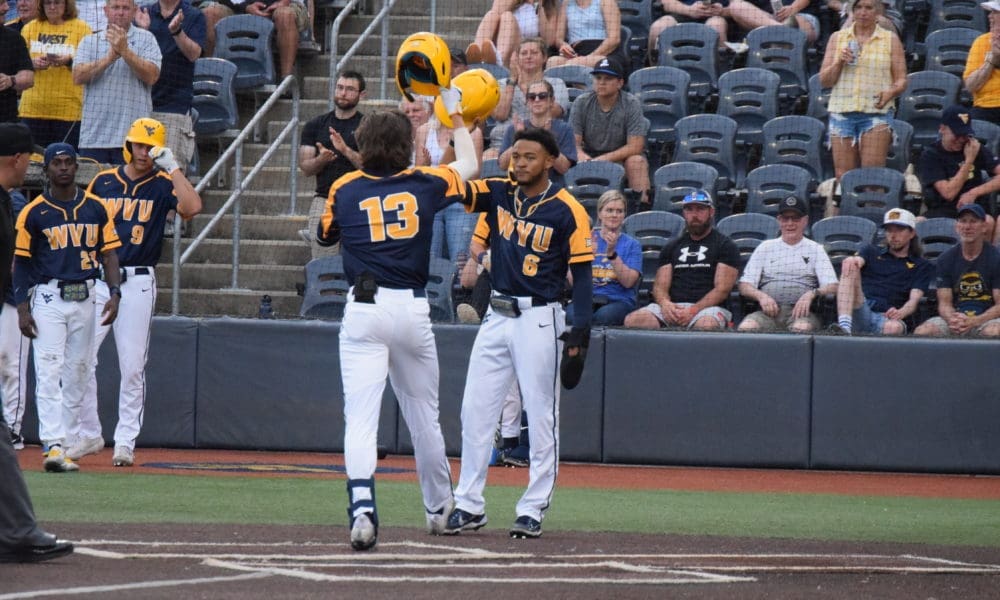 Victor Scott II celebrates with Braden Barry