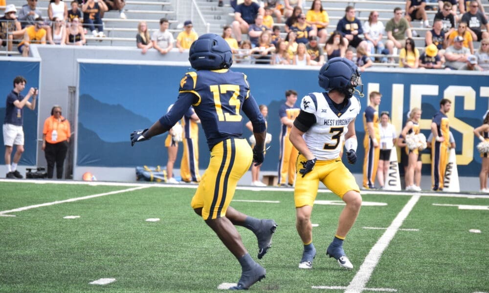 WVU Football WR Kedrick Triplett battling Matt Sieg during scrimmage