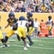 WVU Football DB Geimere Latimer rushing during scrimmage