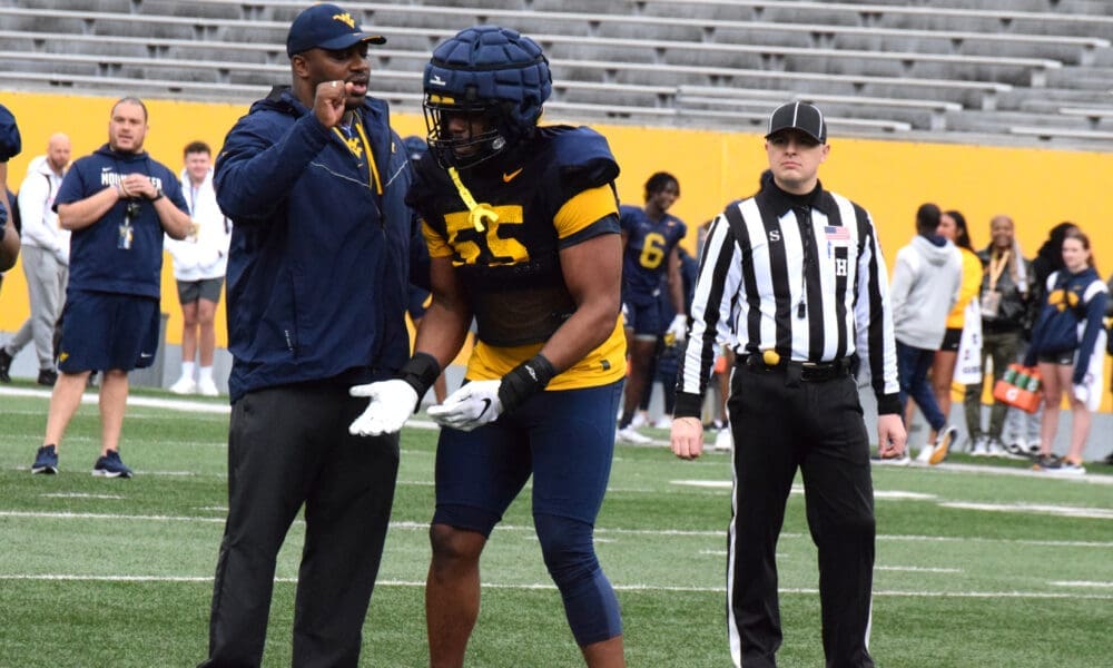 WVU Football DL Davoan Hawkins and Coach Andrew Jackson