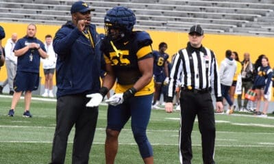 WVU Football DL Davoan Hawkins and Coach Andrew Jackson