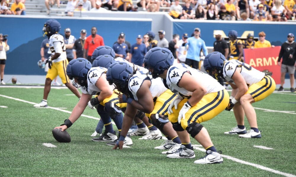 WVU Football Offensive Line line of scrimmage during Gold-Blue scrimmage