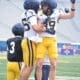 WVU Football Kicker Peter Notaro celebrating with a teammate during a scrimmage