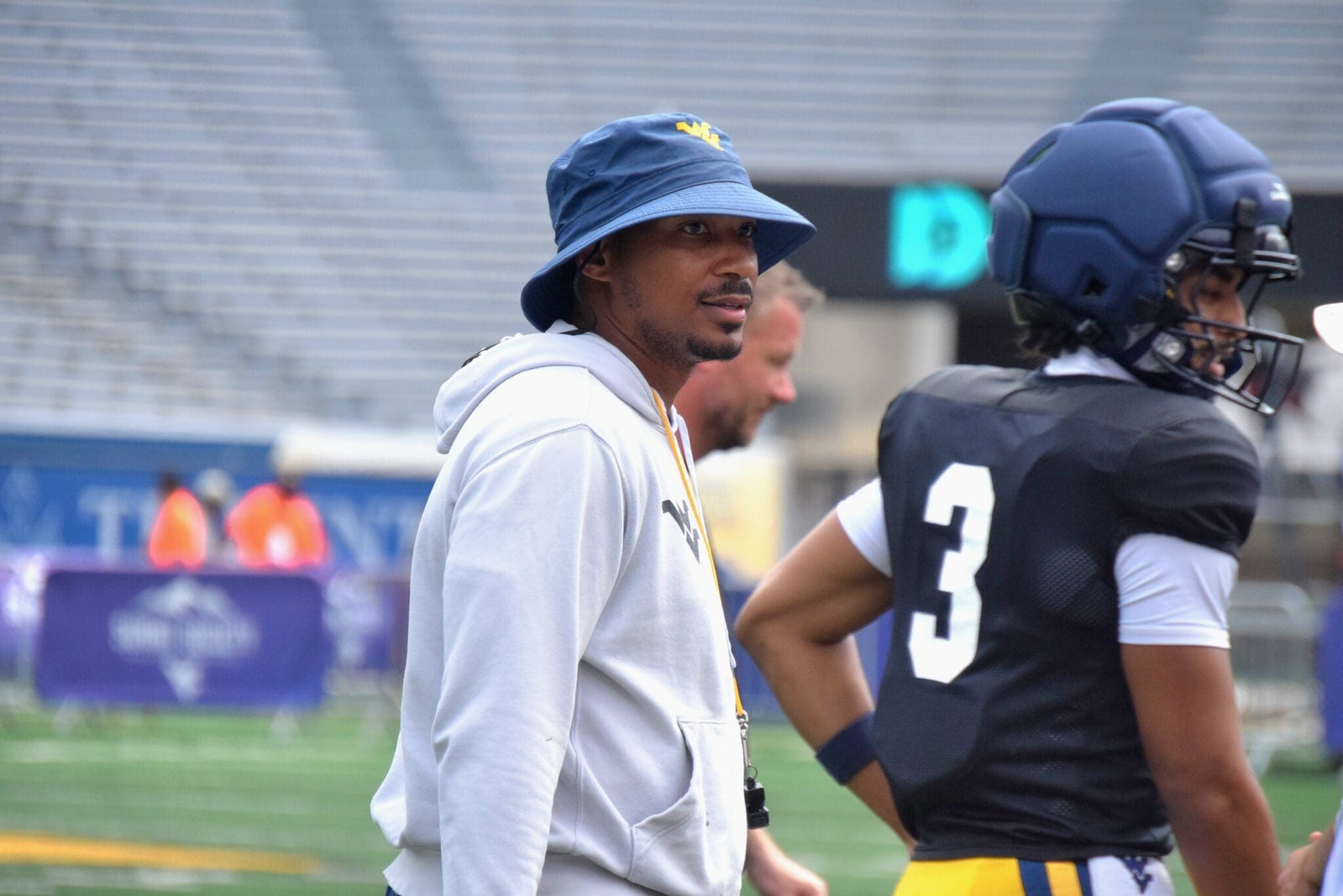 WVU Football legend Pat White with Michael Hawkins Jr.