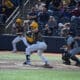 WVU baseball catcher Dayne Leonard drops a bunt.