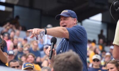 WVU Football HC Rich Rodriguez with fans during spring scrimmage