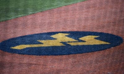 WVU baseball logo on field stock
