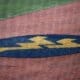 WVU baseball logo on field stock