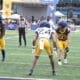WVU Football WR John Neider lining up against Rayshawn Reynolds Jr. in front of the end zone during a scrimmage
