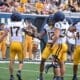 WVU Football Miles Khatri with teammates during scrimmage