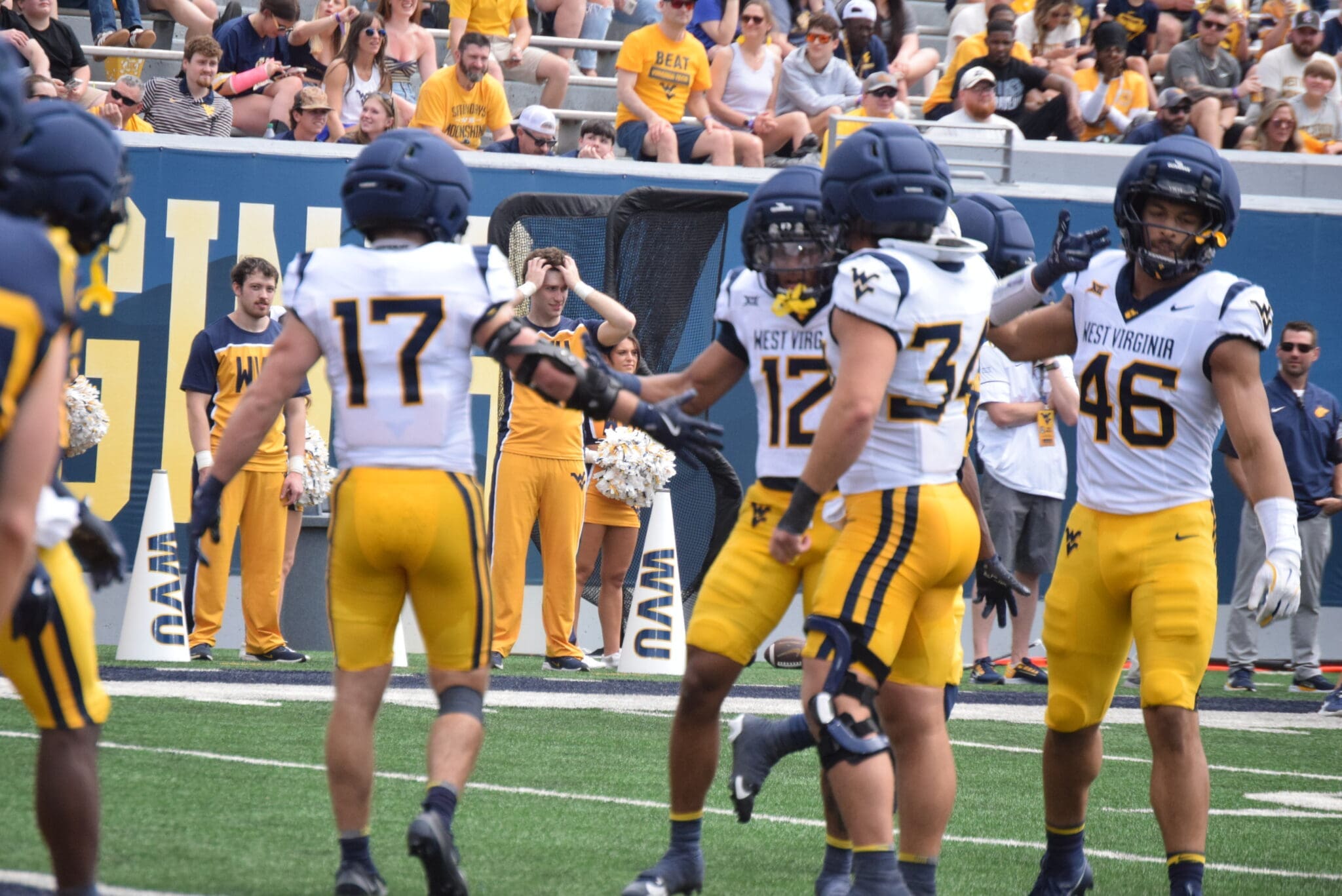WVU Football Miles Khatri with teammates during scrimmage