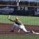 WVU baseball first baseman Grant Hussey stretches for the putout.