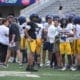 WVU Football QB Michael Hawkins and WR Armoni Weaver-Bomar with teammates during scrimmage