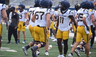 WVU Football players, including TaRon Francis at scrimmage