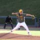 WVU Baseball right-handed pitcher Blaine Traxel throws during a game.