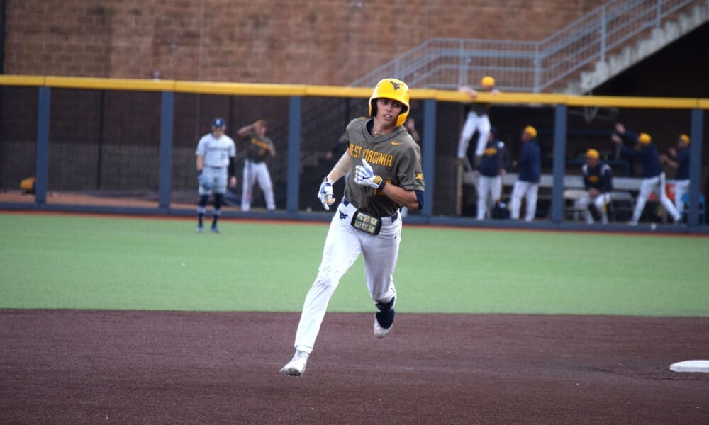 WVU Baseball center fielder Braden Barry rounds the bases.