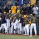 WVU baseball's Braden Barry celebrates with teammates