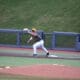 WVU Baseball first baseman Grant Hussey stretches for a catch.