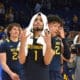 Emmitt Matthews Jr. symbolizes "WV" after win.