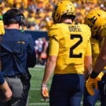 WVU Football HC Neal Brown and Jarret Doege