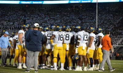 WVU Football Huddle