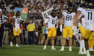 WVU Football Garrett Greene, Devin Carter standing around against Penn State