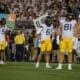 WVU Football Garrett Greene, Devin Carter standing around against Penn State