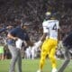 WVU Football RB CJ Donaldson and coaches Chad Scott, Bilal Marshall