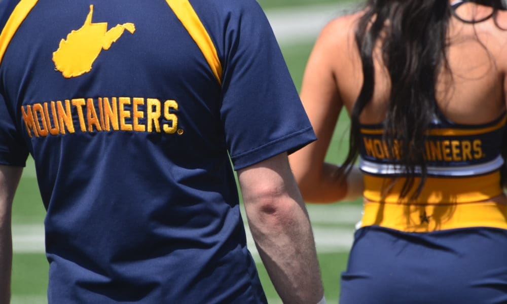 New Big 12 WVU logo on cheerleaders